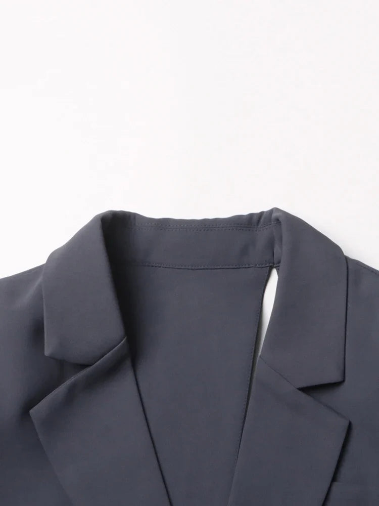Blazer con corte asimétrico